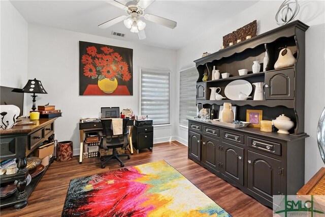 office featuring ceiling fan and dark hardwood / wood-style flooring