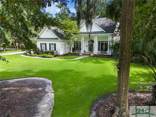 view of front of house with a front lawn and a porch