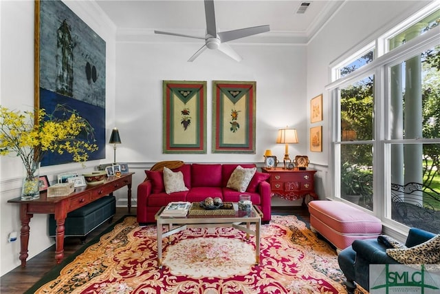 living room featuring ornamental molding, dark hardwood / wood-style floors, and ceiling fan