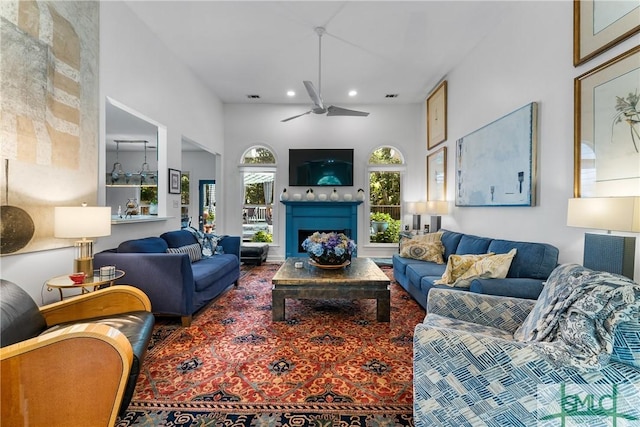 living room featuring ceiling fan