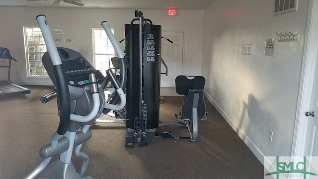 exercise room with ceiling fan