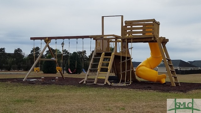 view of playground featuring a lawn