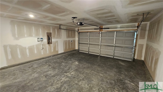 garage featuring electric panel and a garage door opener