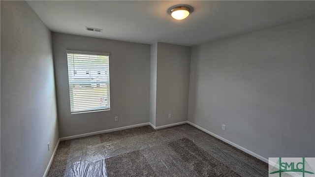 unfurnished room featuring carpet floors