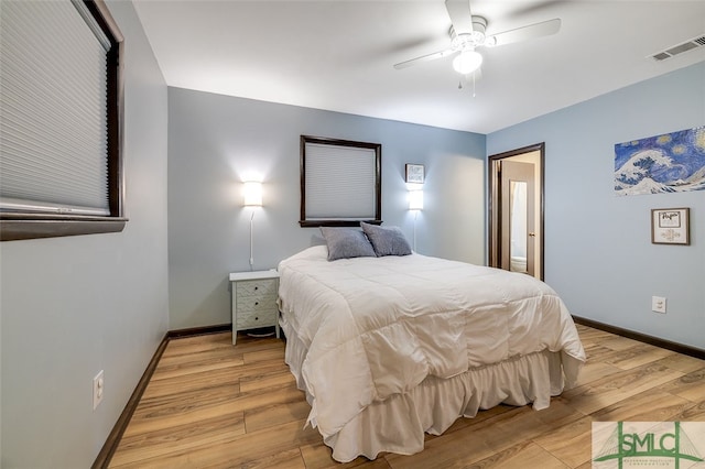 bedroom featuring light wood-type flooring and ceiling fan