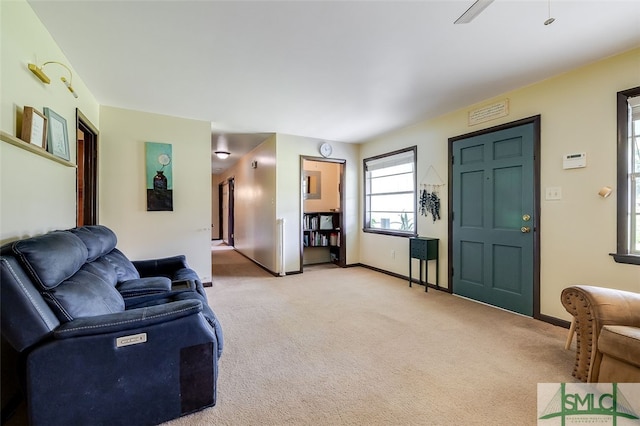 living room with light carpet