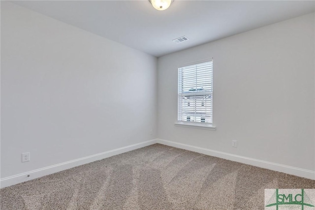 unfurnished room featuring carpet floors