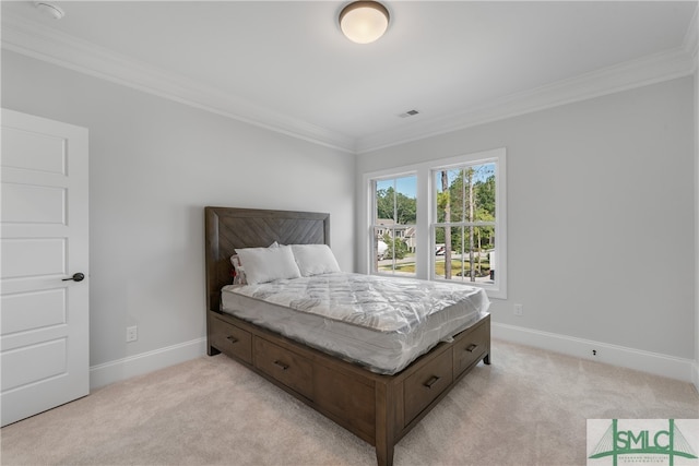 carpeted bedroom with crown molding