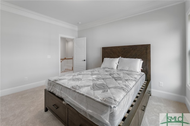 carpeted bedroom featuring crown molding