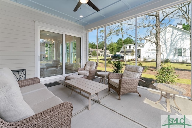 sunroom / solarium with ceiling fan