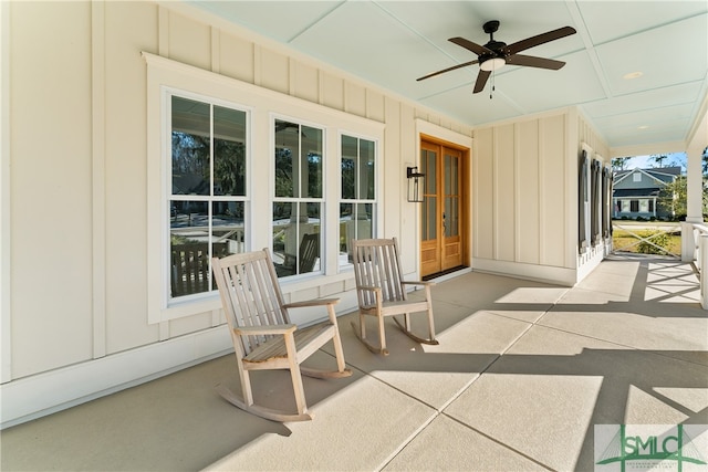 view of patio featuring ceiling fan, french doors, and a porch