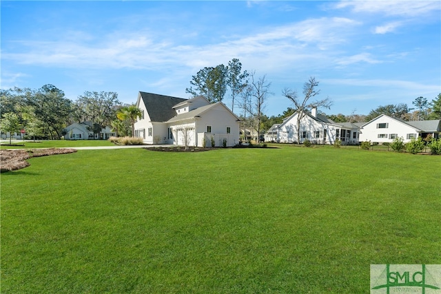 view of yard featuring a garage