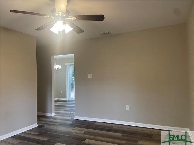 1340 E Henry St, Savannah, GA 31404 - empty room featuring baseboards, visible vents, dark wood-style floors, and ceiling fan