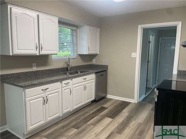 1340 E Henry St, Savannah, GA 31404 - kitchen featuring stainless steel dishwasher, a sink, white cabinets, baseboards, and dark wood-type flooring