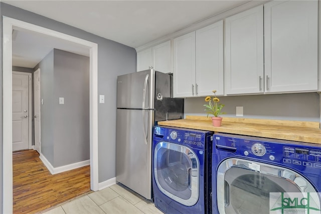 washroom with light hardwood / wood-style floors