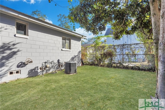 view of yard with central AC unit