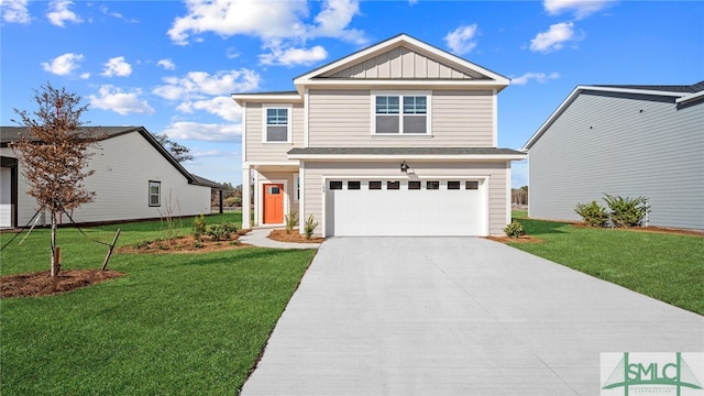 view of front of house featuring a garage and a front yard