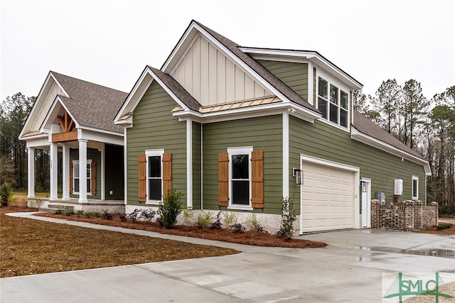 back of property featuring a garage