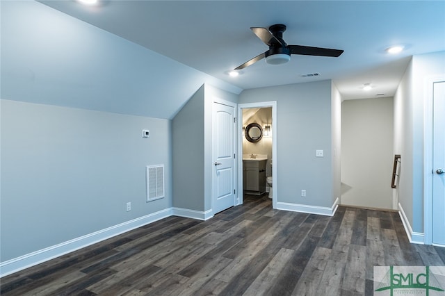 bonus room with dark hardwood / wood-style flooring and ceiling fan