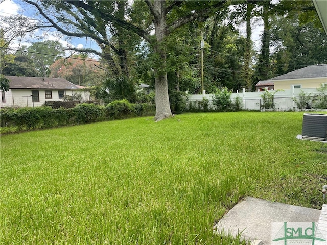 view of yard featuring central AC unit