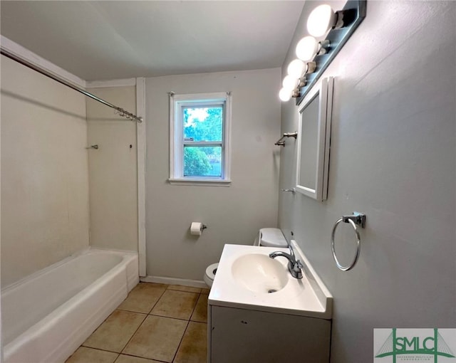 full bathroom with  shower combination, vanity, tile patterned flooring, and toilet