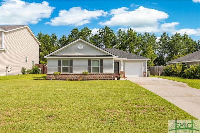 view of front facade featuring a garage and a front lawn