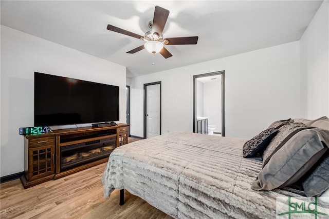 bedroom featuring light hardwood / wood-style flooring and ceiling fan