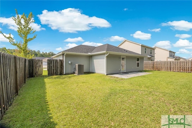 back of property featuring a patio, cooling unit, and a lawn