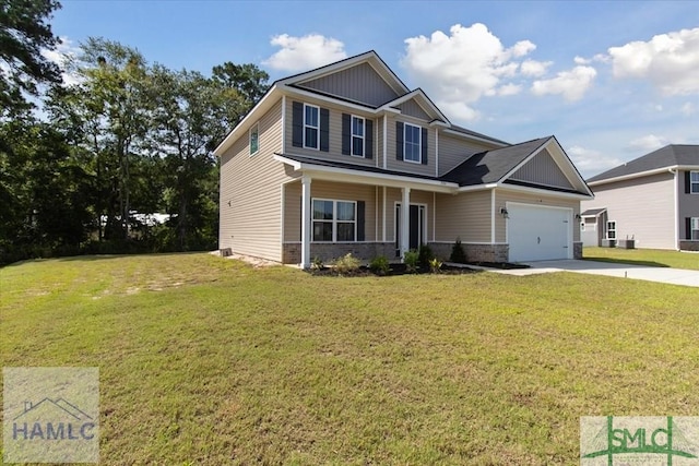 craftsman house with a garage and a front lawn