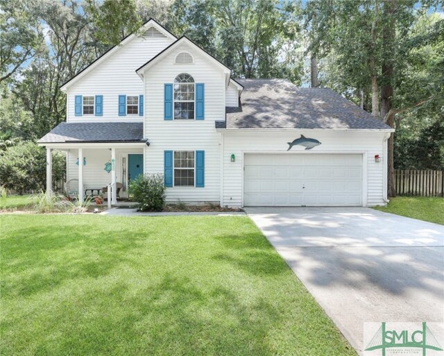 view of front of home featuring covered porch, a front yard, and a garage