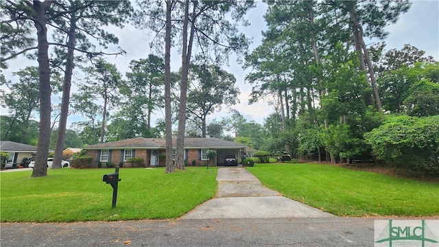 single story home with a front yard