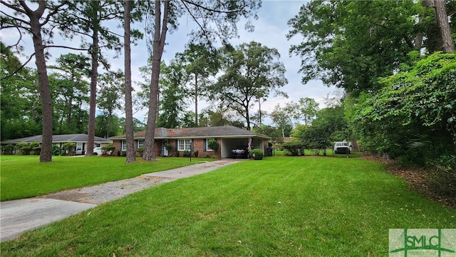 ranch-style home with a front yard and a carport