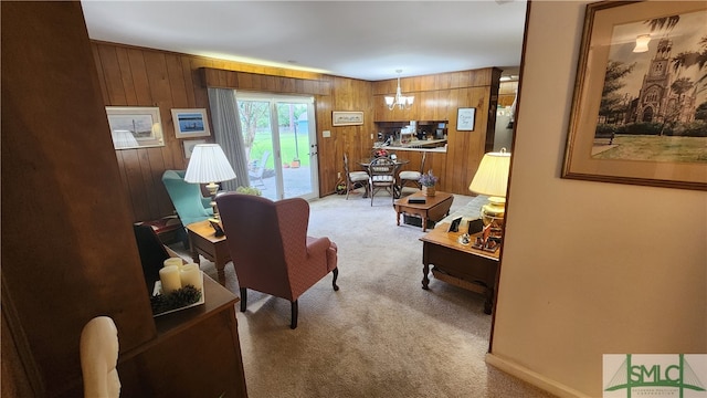 living room with carpet flooring and wooden walls