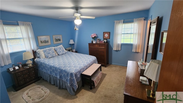 carpeted bedroom featuring ceiling fan