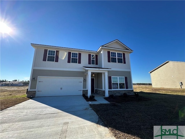 view of front of home with a garage