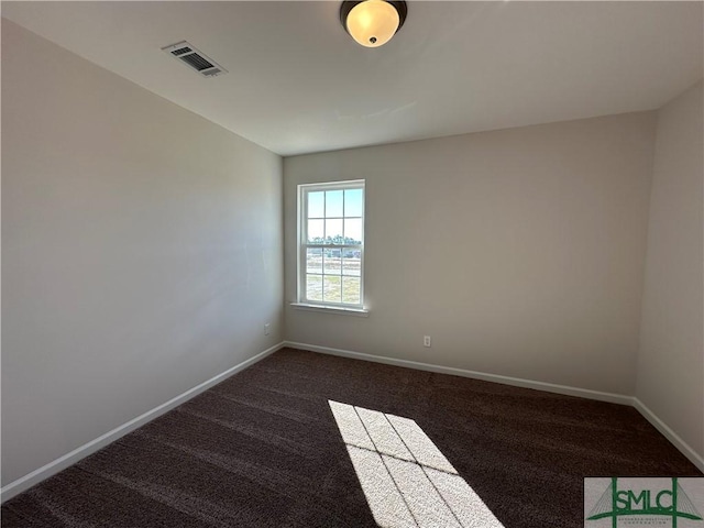 empty room featuring carpet flooring