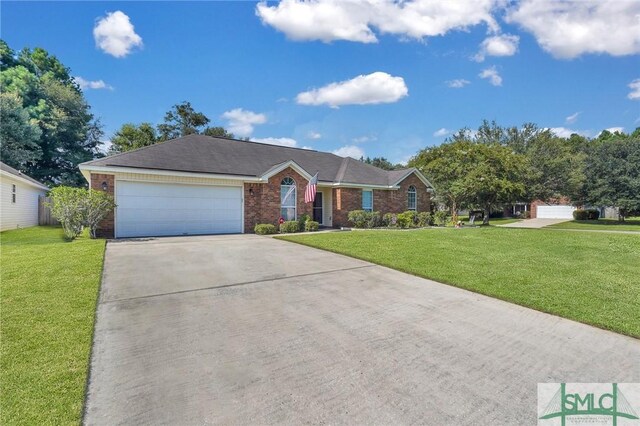 single story home featuring a front yard and a garage