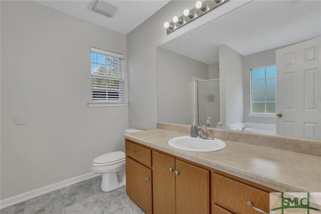 bathroom featuring a tub to relax in, toilet, tile patterned floors, and vanity