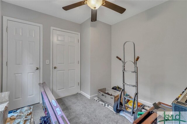 playroom featuring ceiling fan and carpet flooring