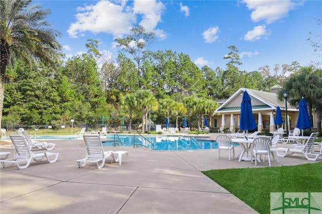 view of pool featuring a patio area