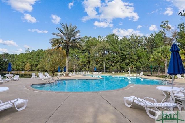 view of pool featuring a patio