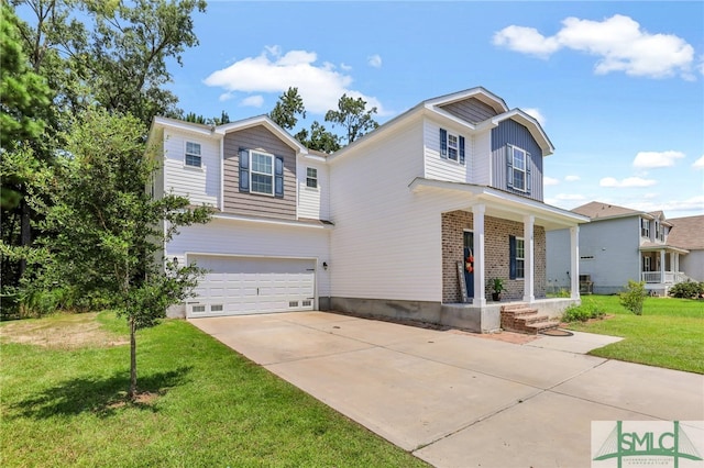 view of front of property featuring a front lawn and a garage