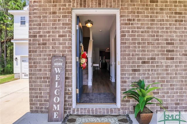 view of exterior entry featuring a garage