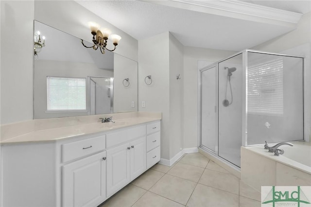 bathroom with separate shower and tub, an inviting chandelier, and tile patterned floors