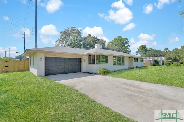 ranch-style house featuring a front lawn and a garage