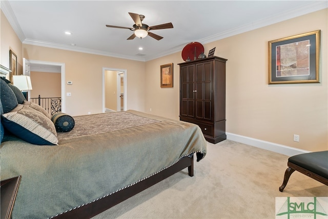 bedroom with ceiling fan, ornamental molding, and light carpet