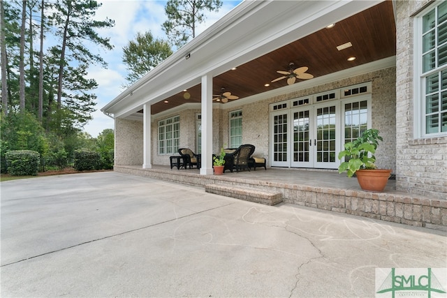 view of patio / terrace featuring ceiling fan and french doors