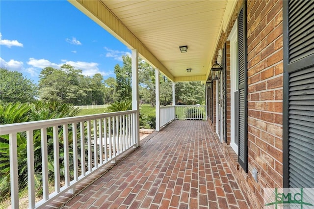 view of patio featuring a porch