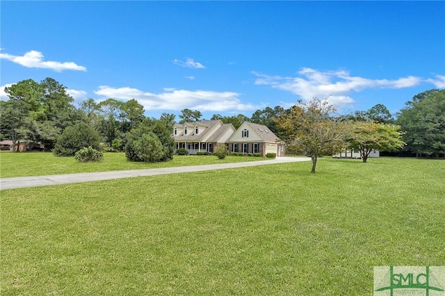 view of front of property with a front lawn