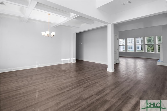 unfurnished living room featuring an inviting chandelier, beam ceiling, and dark hardwood / wood-style flooring